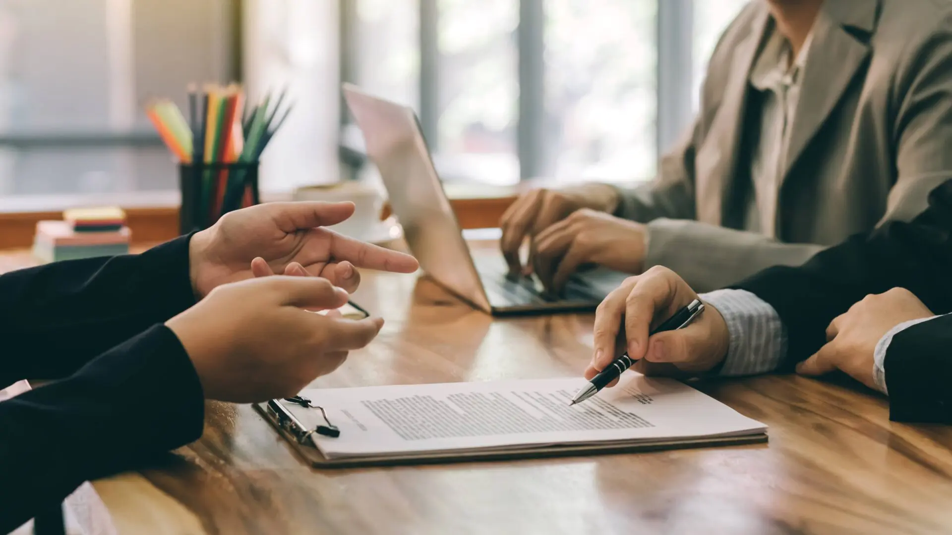 A bail bondsman in Maricopa County, AZ, reviewing legal documents involving their client.